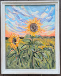 Framed painting of sunflowers with a colorful sky.