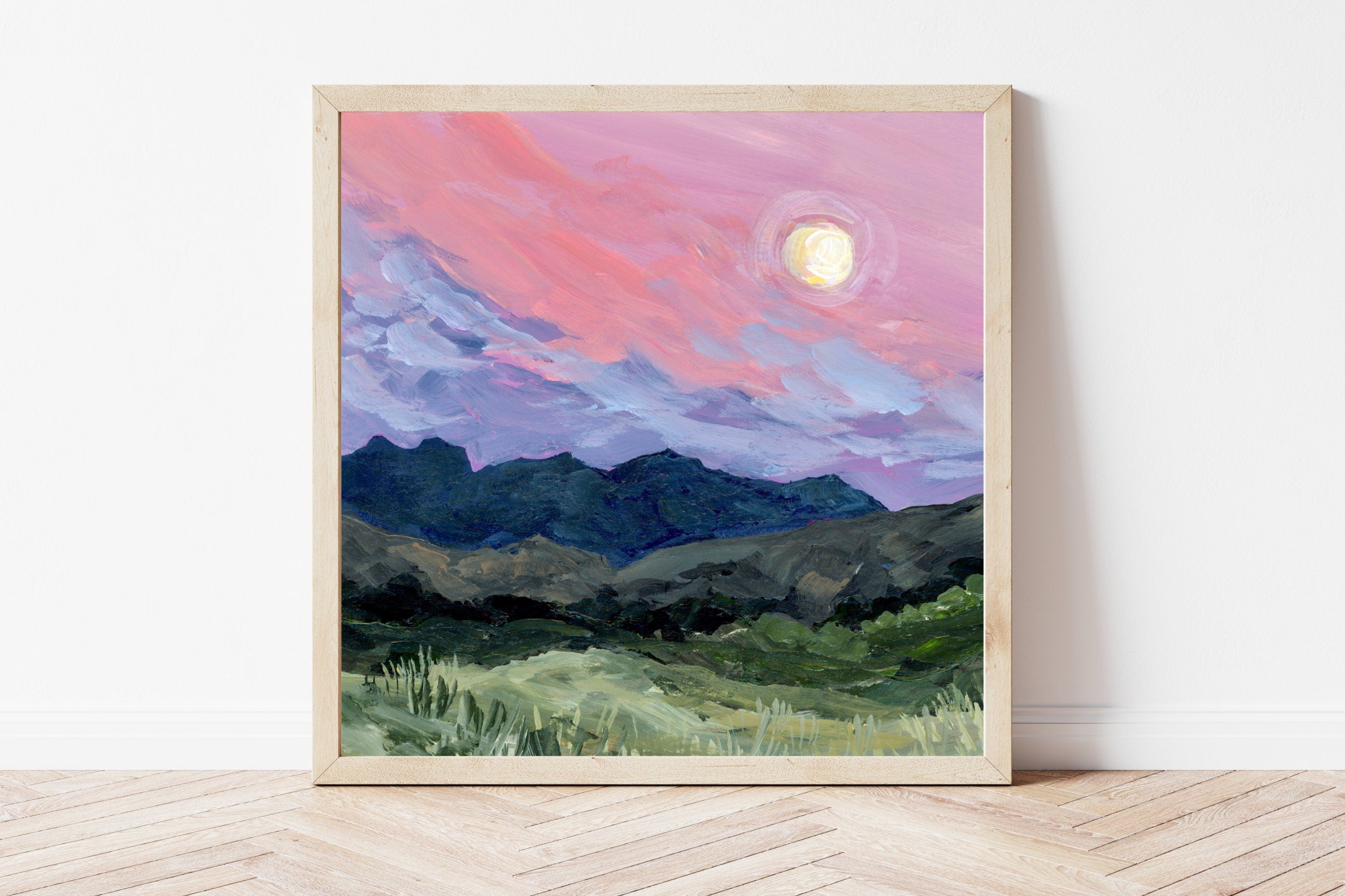 Framed print of a Big Bend mountain landscape with a pink and purple moonlit sky.