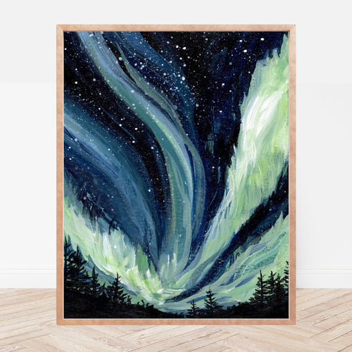 Framed artwork of the Northern Lights against a starry night sky with trees at the bottom.