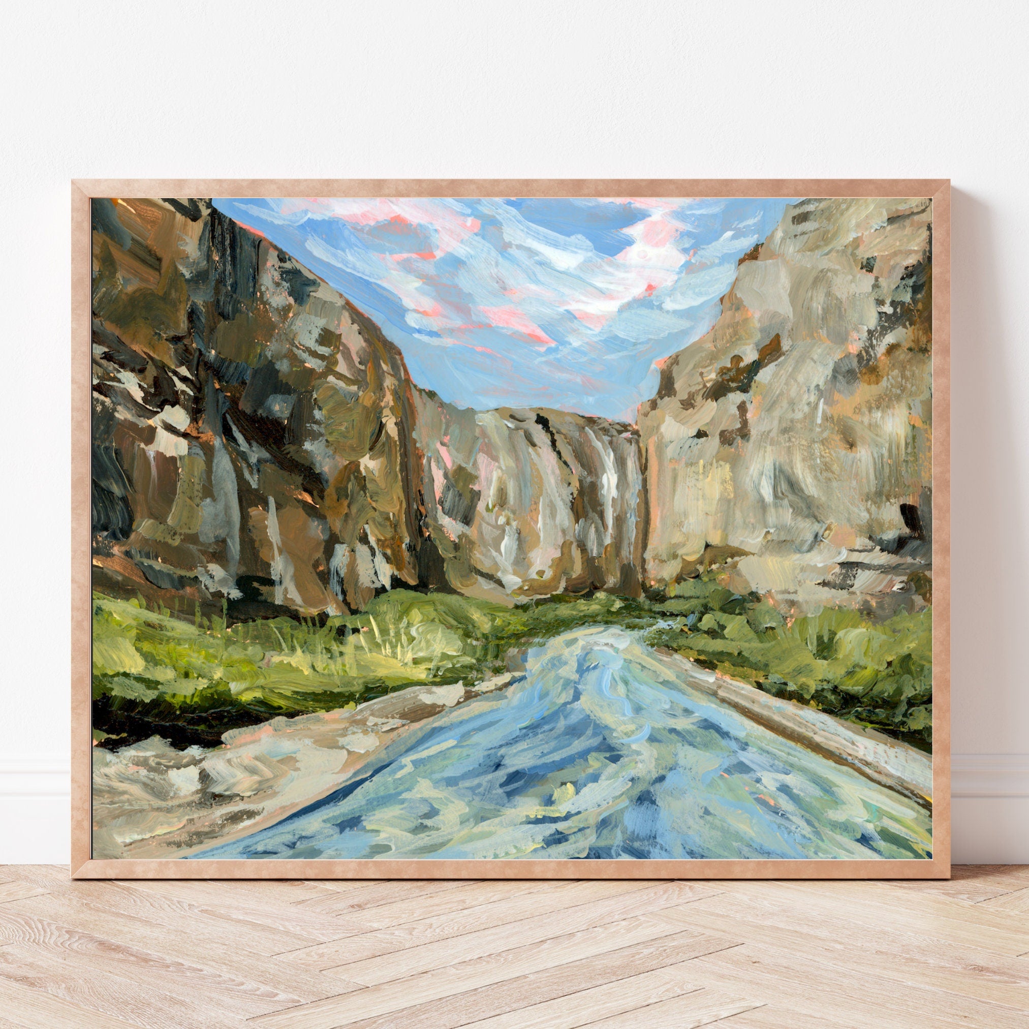 Framed painting of Big Bend National Park's Santa Elena Canyon with the Rio Grande river on a white wall.