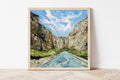 Framed painting of Big Bend National Park's Santa Elena Canyon with the Rio Grande river on a white wall.