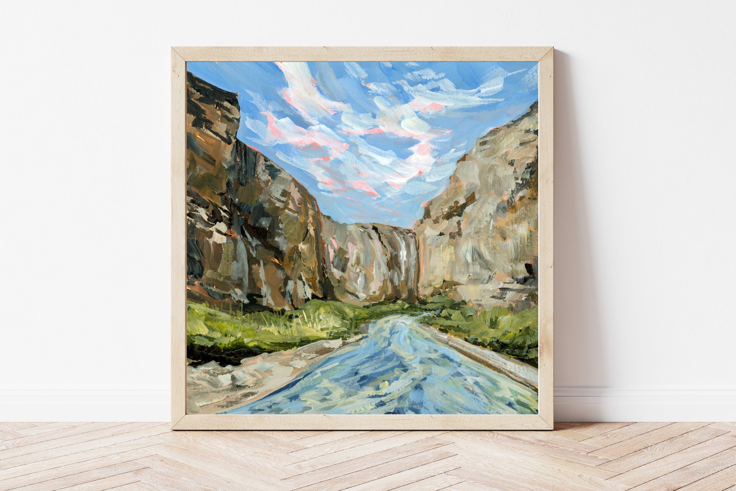 Framed painting of Big Bend National Park's Santa Elena Canyon with the Rio Grande river on a white wall.